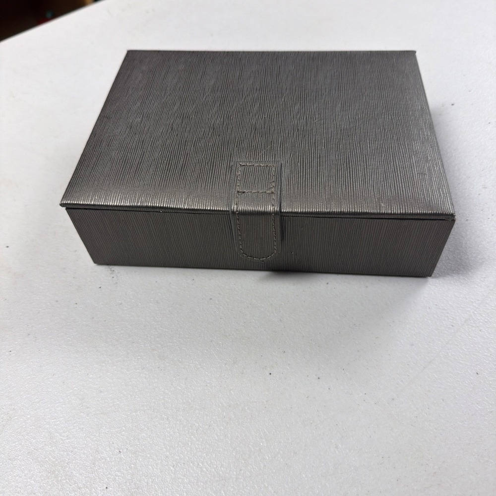 Mele & Co. gray textured ring organizer featuring a plush light gray